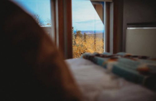 Fairbanks Ski Chalet | This A-frame is surrounded by mountain ranges that you can enjoy from the many windows