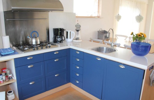 Workum House | This inviting and comfortable villa is located right on the water.