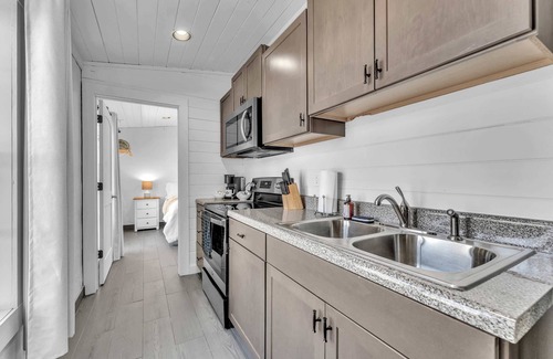 South Pittsburg Cabin | This is IT Cabin with a hot tub, fire pit, & indoor pool!