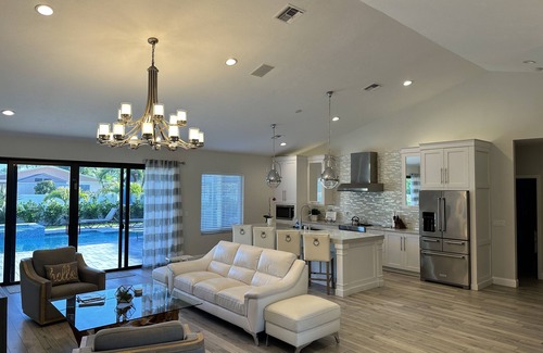 Naples Park House | This large property was fully renovated new heated salt water pool and spa