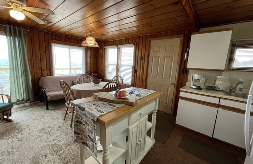 Oscoda Cabin | Three bedrooms with kitchen and a huge deck.