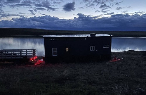 Stratford Cabin | Tiny House on Moses Lake with Dock, Boat Launch, Large deck w/ Hot Tub and grill