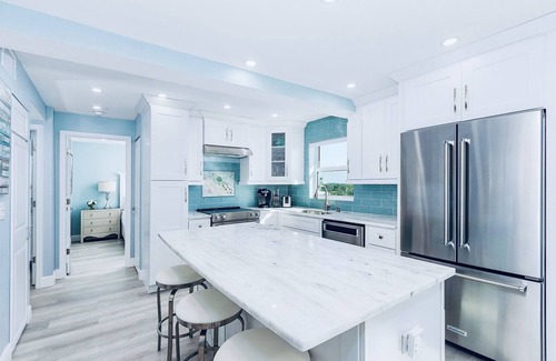 Fort Myers Beach Condo | Top Floor Beachfront & Sunset Views! Renovated! WIFI, Smart TV's + Work Space!