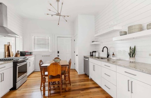 South of Broad Apartment | Top Floor & Lake Views! Stylish 2BR Downtown Condo