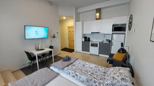 Jyvaskyla Apartment | Top location city center studio with balcony and free parking Kotimaailma Apartments