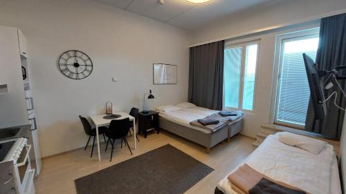 Jyvaskyla Apartment | Top location city center studio with balcony and free parking Kotimaailma Apartments