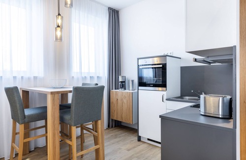 Wismar Apartment | Topmodernes Eck-apartment mit Hafenblick und Fußbodenheizung im Hafen von Wismar