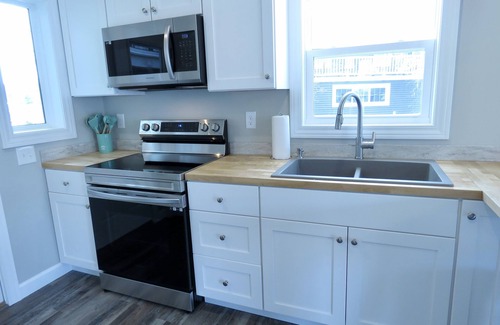 Rapid City Cottage | Torch Lake Sandbar Directly Across The Street With Outdoor Dock Slip Unit B