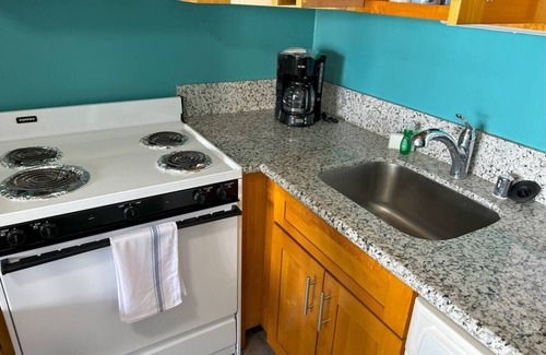 McCully - Moiliili Condo | Total of 2 bedrooms at Royal Kuhio, Sleeps 8, with AC. Two units, same floor,