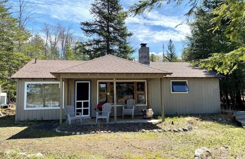 Bellaire Cabin | Tranquil Grass River Cottage Retreat