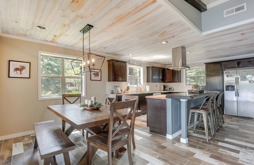Tomahawk Cabin | Tranquil Lakefront Cabin: Fire Pit, Grill & Patio