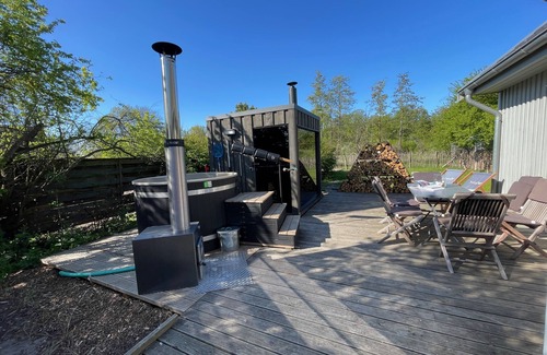 Luckow House | traumHaff®Romance of the boatswains with fireplace, private NORDICSPA, fireplace