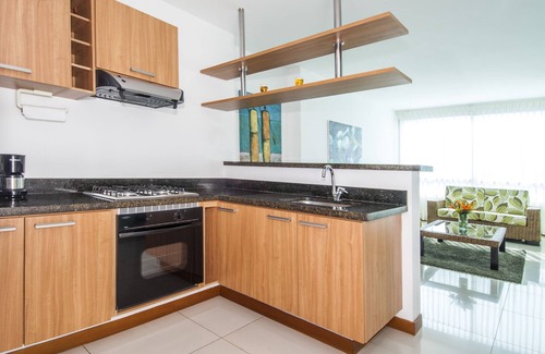 Castillogrande Apartment | Travelers Suites Orange Cartagena