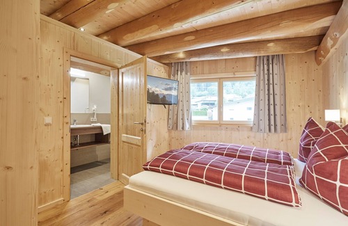Oetz Cabin | Tree trunk house with very large living and leisure area on approx. 240m2 living space!