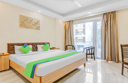 Sushant Lok Hotel | Treebo Sai Village Gold Souk - Sec 43