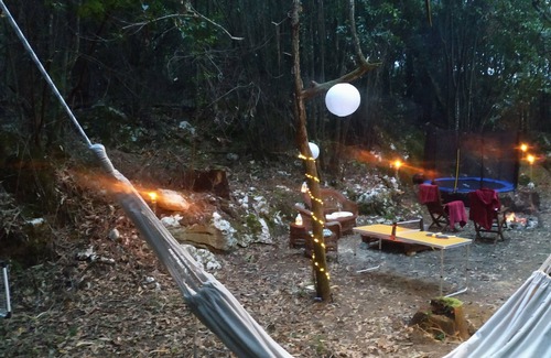 La Iglesia Cabin | Treehouse in rural forest area, charming Tipi Glamping tent in downtown area