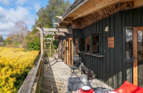 Taupo House | Treetop Hideaway - Taupo Holiday Home