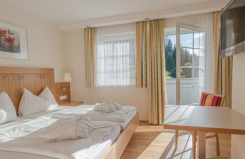 Haus im Ennstal Cottage | Triple room half board - Cafe Pension Kitzer