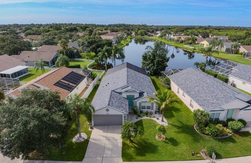 Sabal Harbour House | Turtle Lake - Inspiring Lake Views with Heated Pool
