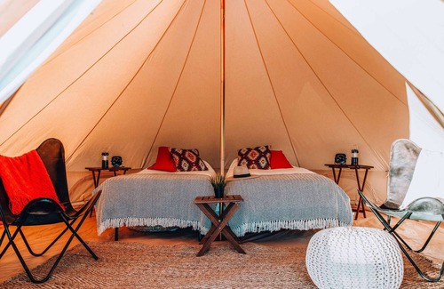Tropic House | Twin Tent w/Shared Bathroom - Beauty awaits you just past the red cliffs.