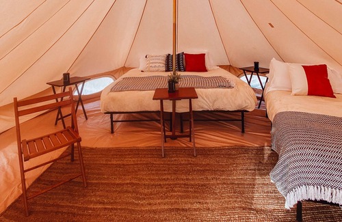 Tropic House | Twin Tent w/Shared Bathroom - Beauty awaits you just past the red cliffs.
