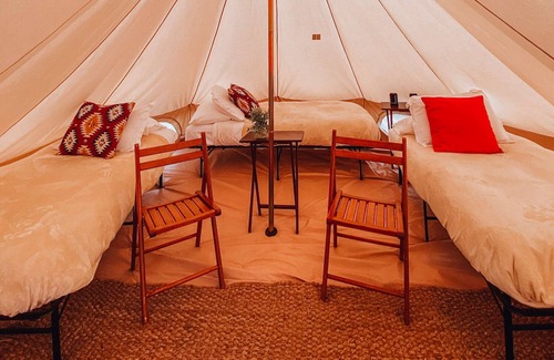 Tropic House | Twin Tent w/Shared Bathroom - Beauty awaits you just past the red cliffs.
