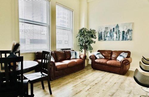 Mile Square Apartment | Two Bedroom Game Day Suite with 100 Projector TV