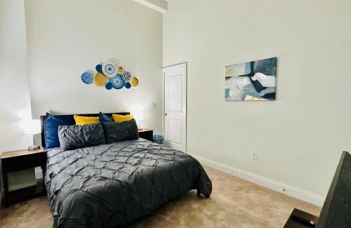 Mile Square Apartment | Two Bedroom Game Day Suite with 100 Projector TV