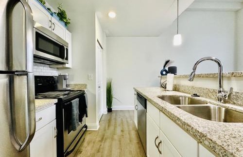 Mile Square Apartment | Two Bedroom Game Day Suite with 100 Projector TV