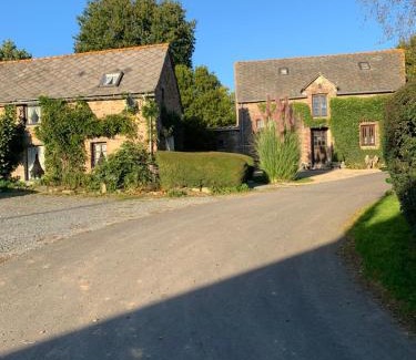 Plouguenast House | Two Cottages in Beautiful Brittany 5 Bedrooms Sleeps 10 Pets Welcome Heated Swimming Pool Free Wifi