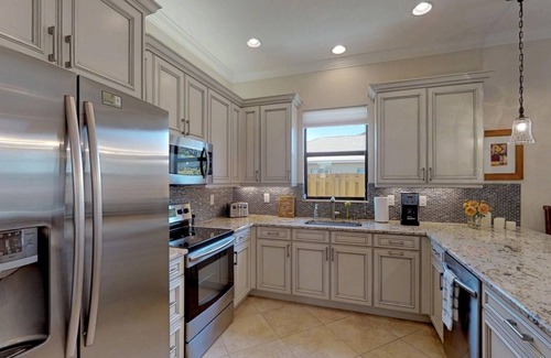 Naples Park House | Two Master Bedrooms! Less than 1 Mile to the beach with heated pool and spa