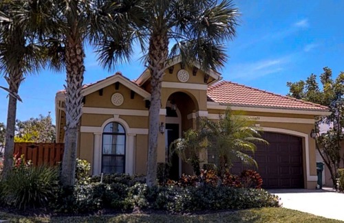 Naples Park House | Two Master Bedrooms! Less than 1 Mile to the beach with heated pool and spa