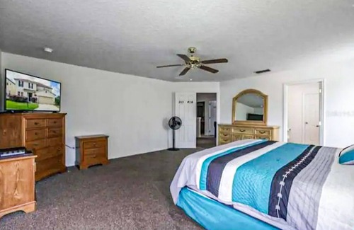 Windwood Bay House | Two-story home with private pool, screened patio, & BBQ - near golf/Disney