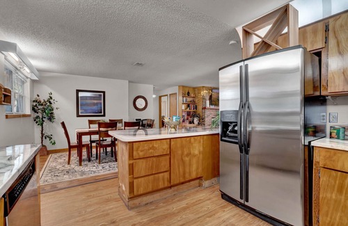 Eustis House | Uhost AI | 4BR Getaway |Cozy Firepit & Hot Tub Fun