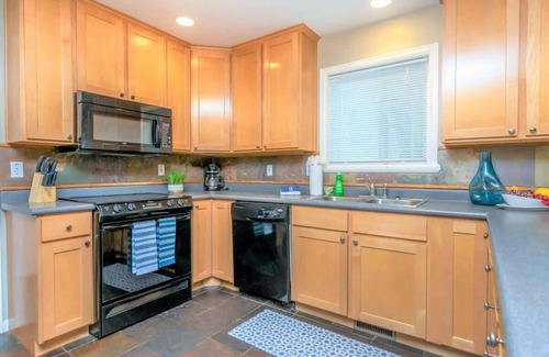Midvale House | Union Spruces in Salt Lake with Hot Tub and Foosball