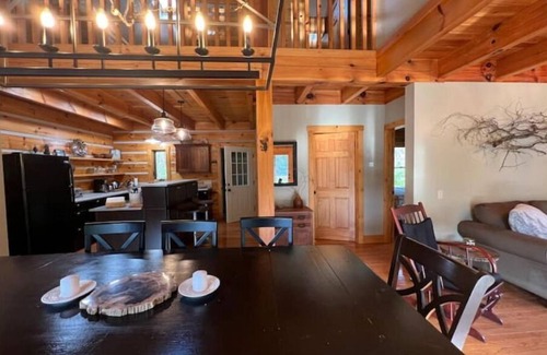 Twelve Mile Cabin | Unique Log Cabin Retreat on 138 Acres, swim, fish, boat, paddleboard, kayak!