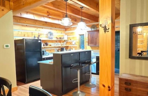 Twelve Mile Cabin | Unique Log Cabin Retreat on 138 Acres, swim, fish, boat, paddleboard, kayak!