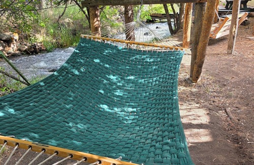Cedaredge Cabin | Unit 9 at the Cedaredge Lodge: Creekside Comfort with a Touch of Mountain Magic.