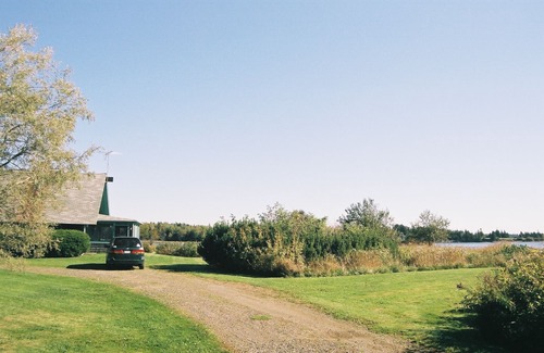 Owls Head House | UNPLUGGED! Trade digital screens for porch screen views of cove, meadow and sea