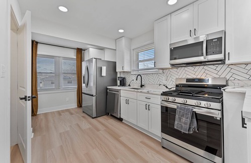 Northeast House | Unwind in our bold + stylish 4BR, 2BA DC gem!