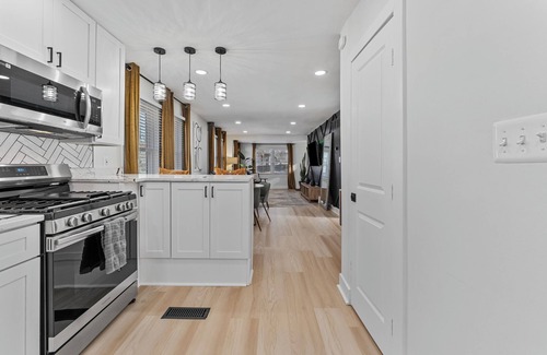 Northeast House | Unwind in our bold + stylish 4BR, 2BA DC gem!