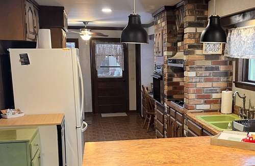 West Branch Cottage | Up North Fall Escape: Golf, Bonfires, Flannels & Crisp Northern Nights.