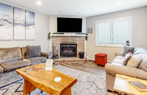 Ludlow Condo | Updated condo with water views, fireplace, ski-in/out, washer/dryer, & tennis
