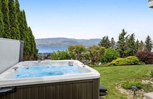 Southwest Mission House | Upscale home with gorgeous lake views, private hot tub, fireplace & firepit