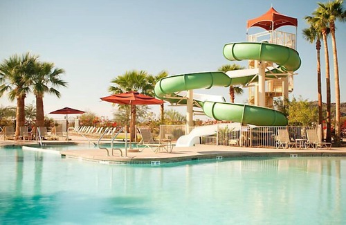 Cibola Vista Resort | UpScale Resort with Outdoor Heated Pool with a waterslide and a poolside bar, tennis court and gym