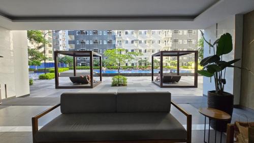 Pasig Apartment | Urban Oasis 2BR Condo with Multiple Pools at SMDC Charm Residences