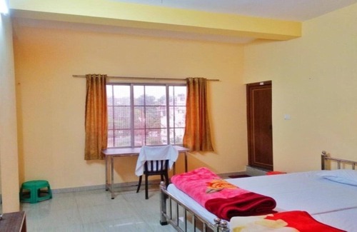Siliguri House | Ushashee Amidst Nature- Deluxe double bed room-I