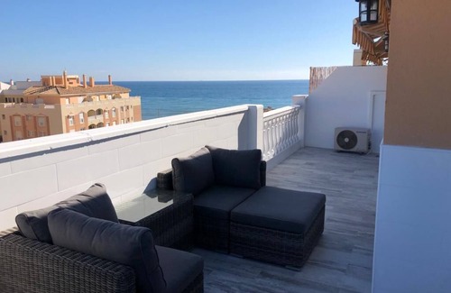 Moclinejo Apartment | Vacation apartment, directly on the beach with 2 terraces.