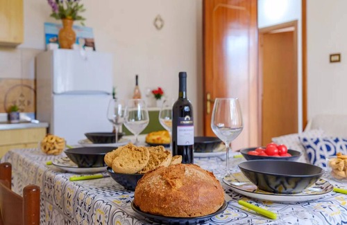 Torre Specchia Ruggeri House | Vacation Home in Torre Specchia Ruggeri with 2 bedrooms sleeps 8