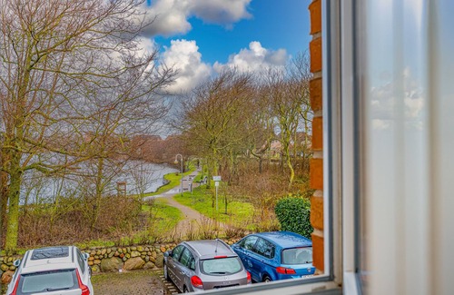 Wenningstedt-Braderup Apartment | Vacation apartment by the village pond for up to 2 people with balcony.